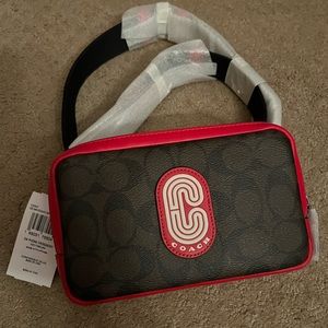 Coach Carrier Phone Crossbody In Colorblock Signature Canvas With Coach Patch.
